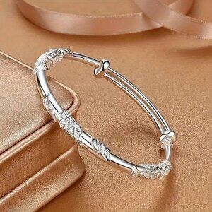 1pc.  Exquisite Carved Flower Silkvery Bracelet